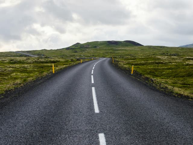 Photo by Pixabay: https://www.pexels.com/photo/gray-concrete-road-towards-green-mountain-416974/
